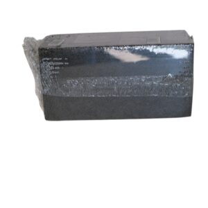 Black marble stone slab with polished surface and text engraving.