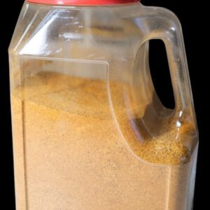 A plastic container filled with brown powder, possibly sugar or spice.