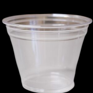 A clear plastic cup on a black background.