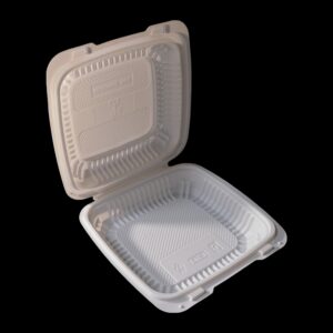 Open white biodegradable clamshell food container on black background.
