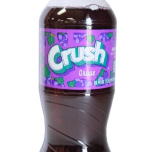 A bottle of grape Crush soda with purple label and dark liquid.