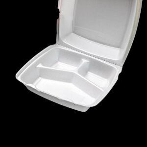 White divided foam food container with lid open on black background.