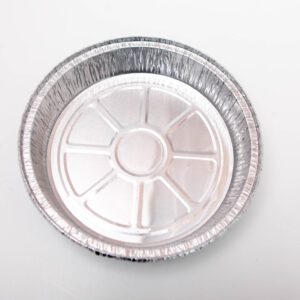 A round aluminum foil pie pan with a segmented base.