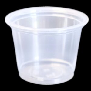 A clear plastic cup against a black background.
